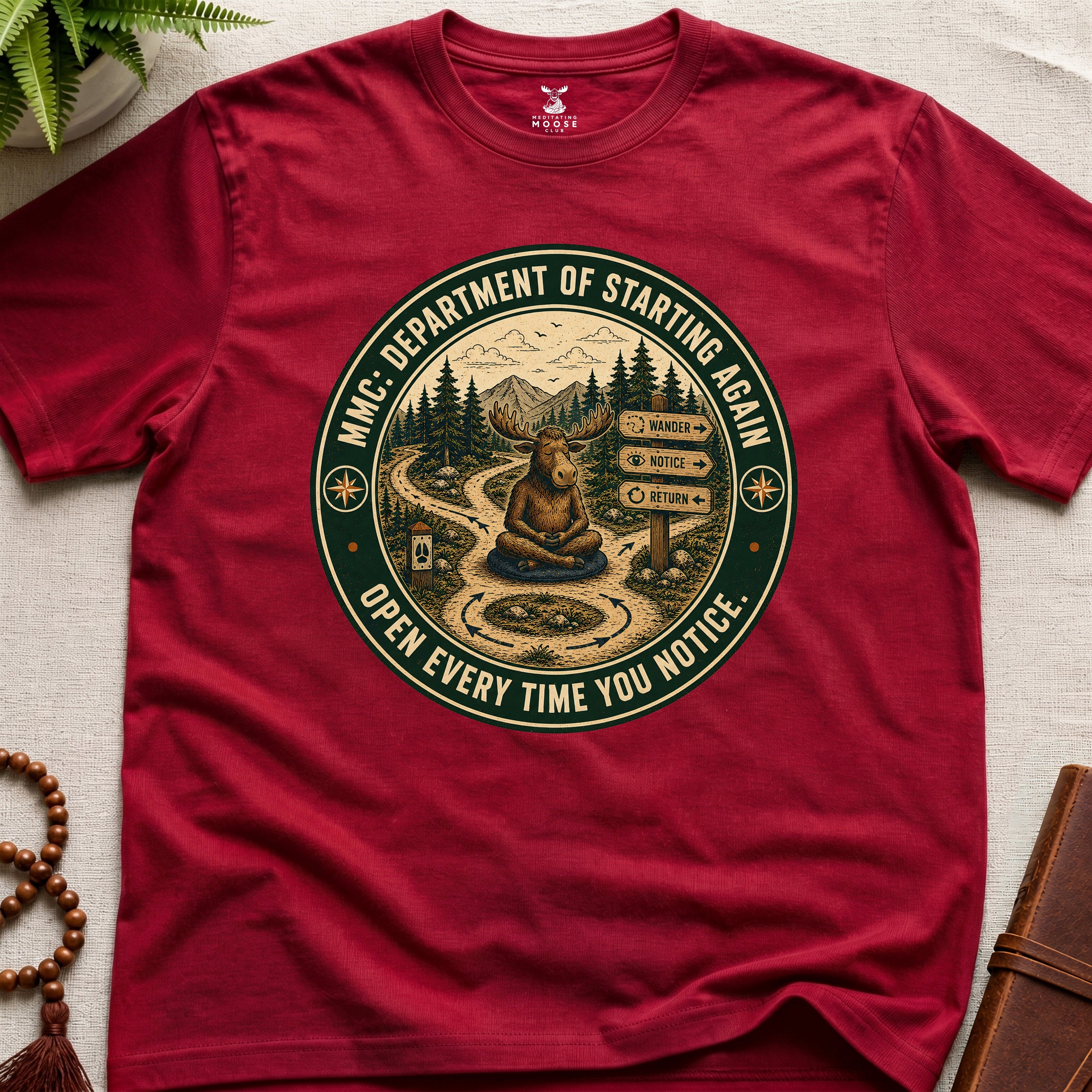 Red funny mindfulness t-shirt mockup featuring Meditating Moose Club Department of Starting Again moose graphic