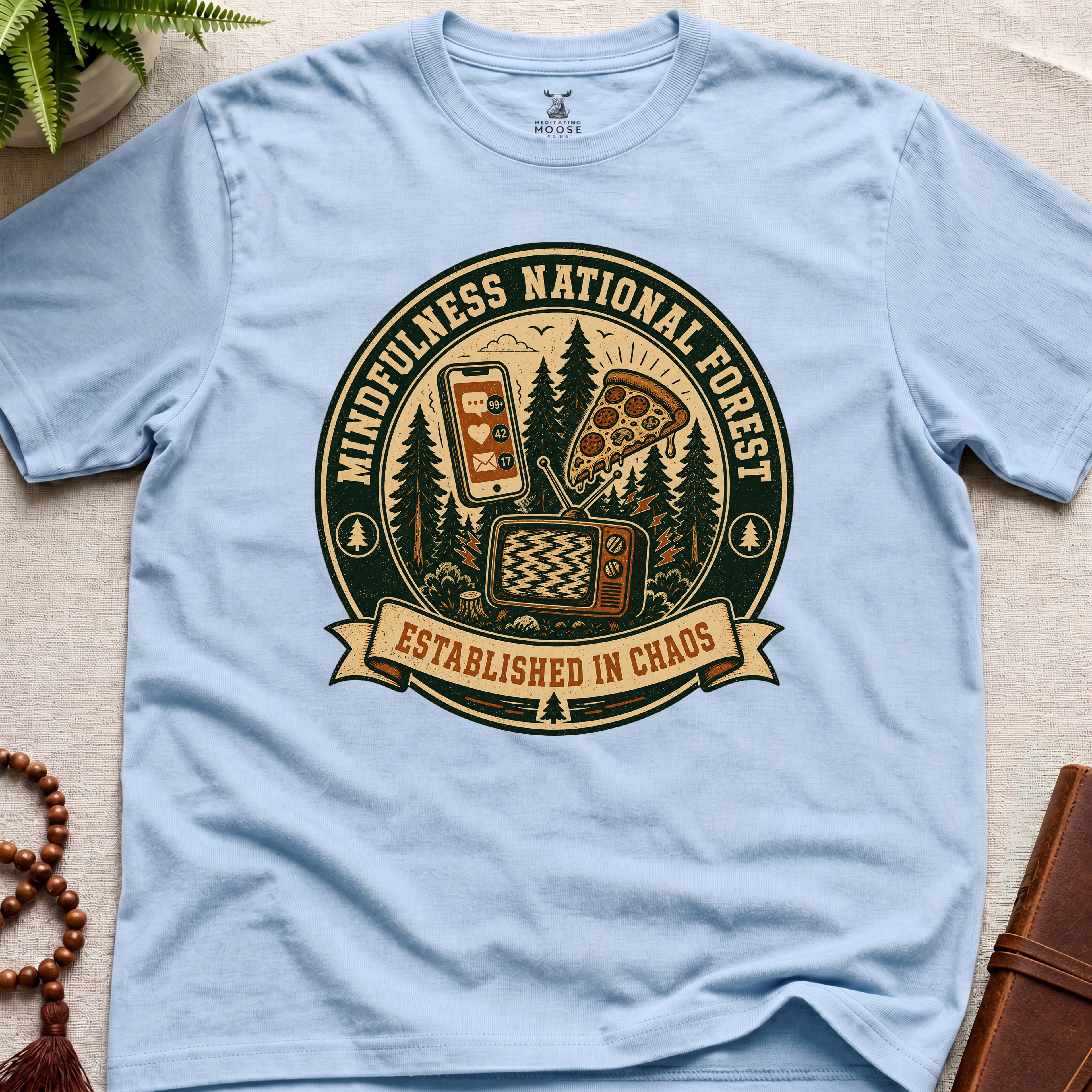 Light blue funny mindfulness t-shirt mockup featuring Mindfulness National Forest distracted mind graphic design