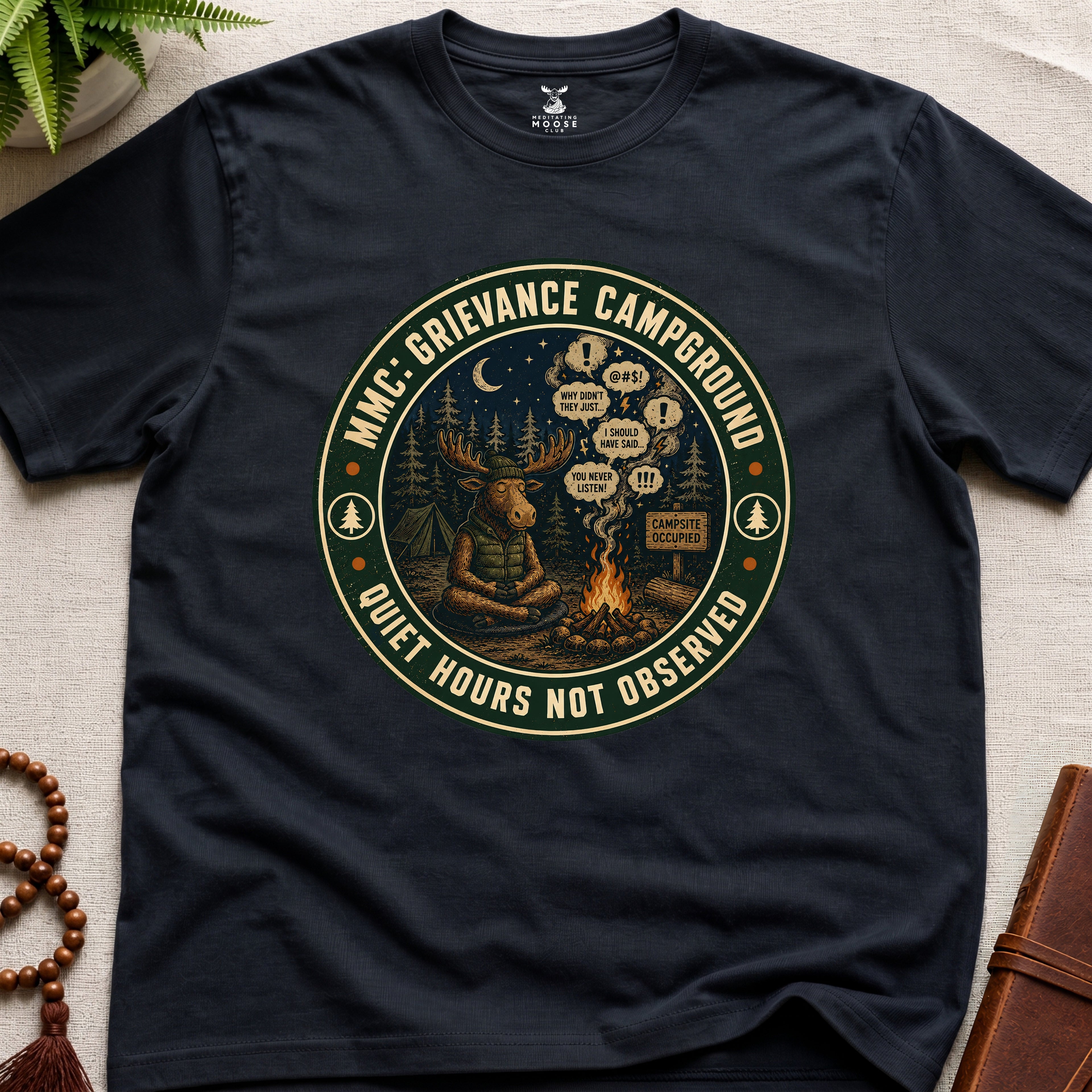 Black funny mindfulness t-shirt mockup featuring Meditating Moose Club Grievance Campground overthinking graphic