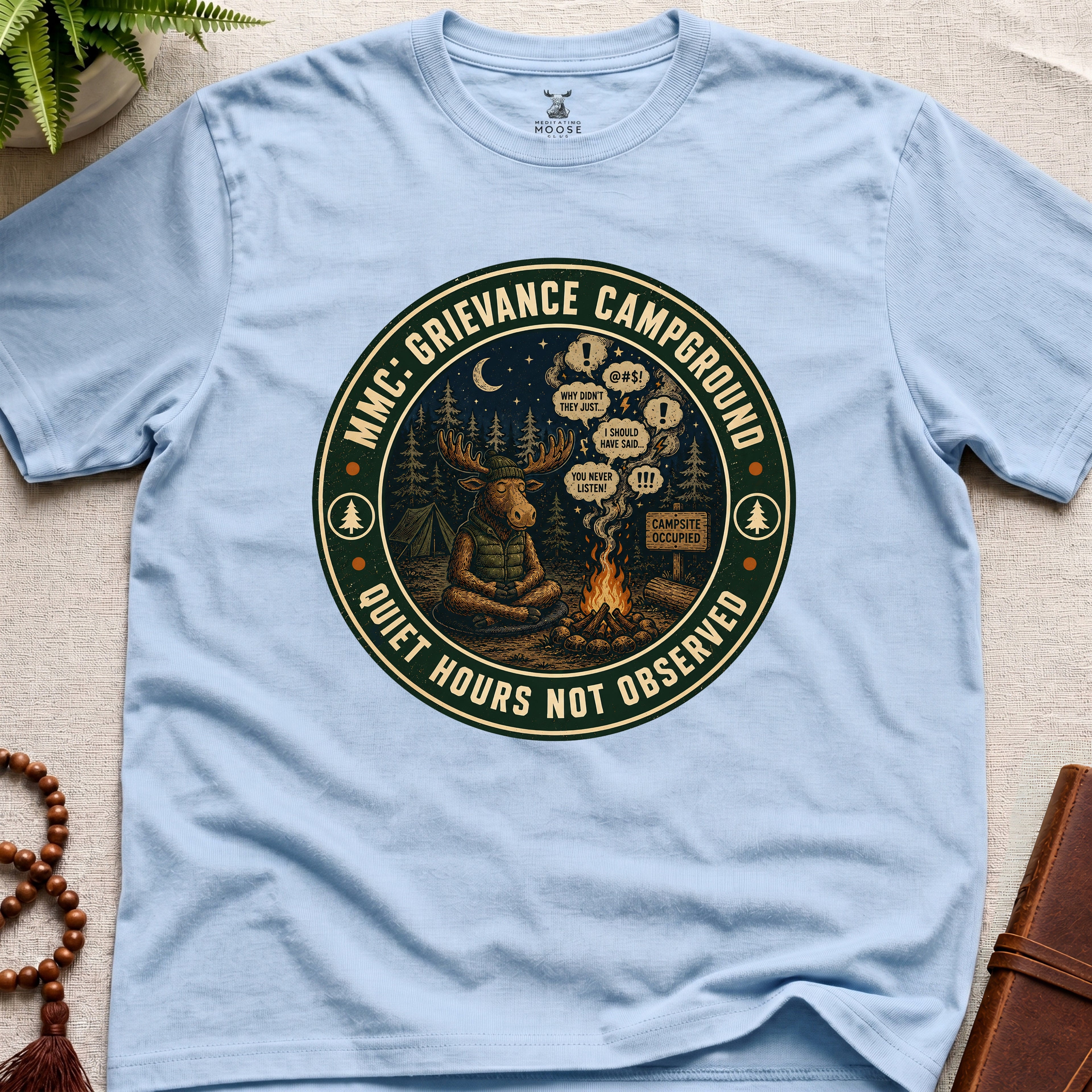 Light blue funny mindfulness t-shirt mockup featuring Meditating Moose Club Grievance Campground overthinking graphic