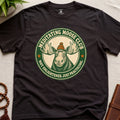 Dark brown mindfulness t-shirt mockup featuring Meditating Moose Club signature moose logo graphic