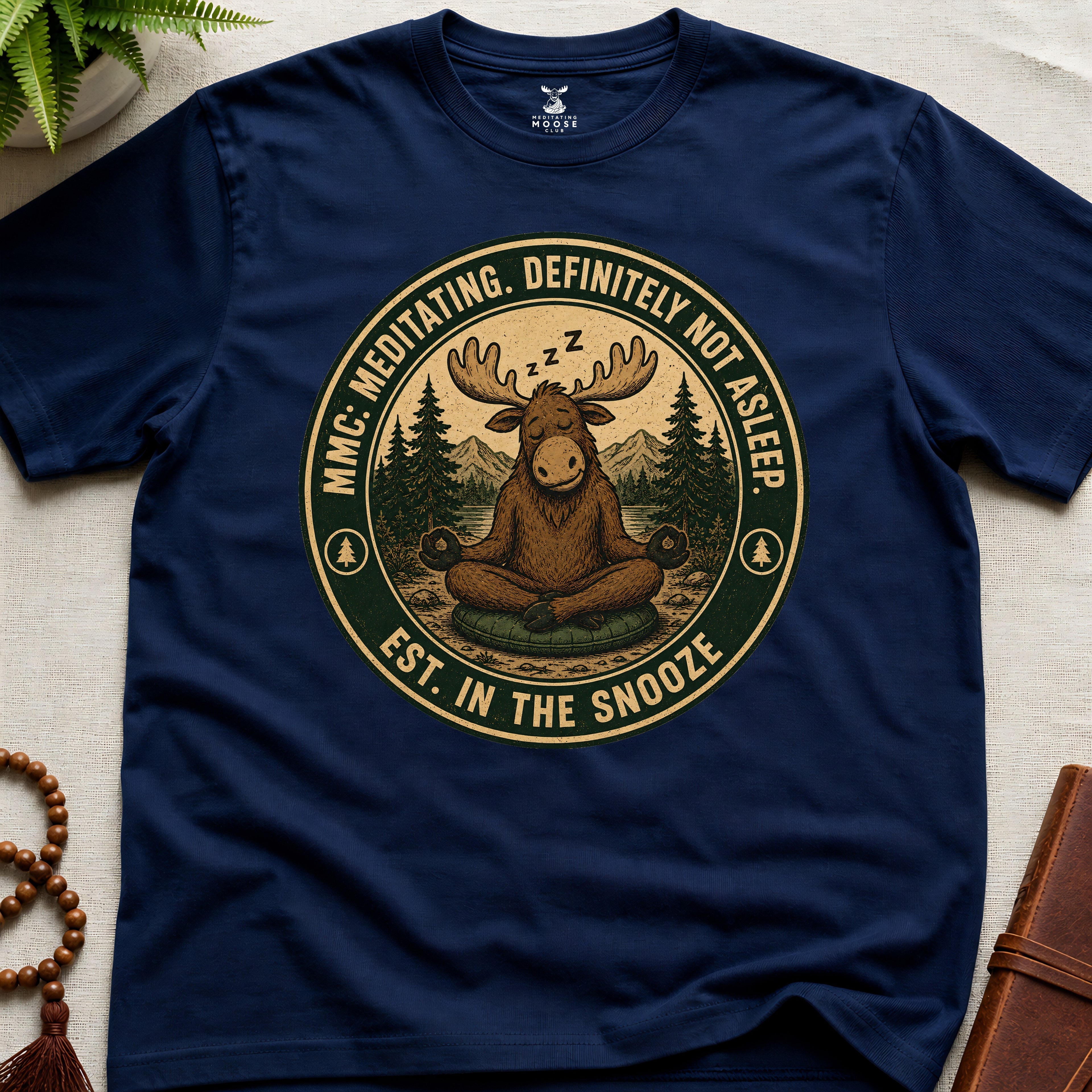 Navy funny meditation t-shirt mockup featuring Meditating Moose Club sleepy moose mindfulness graphic