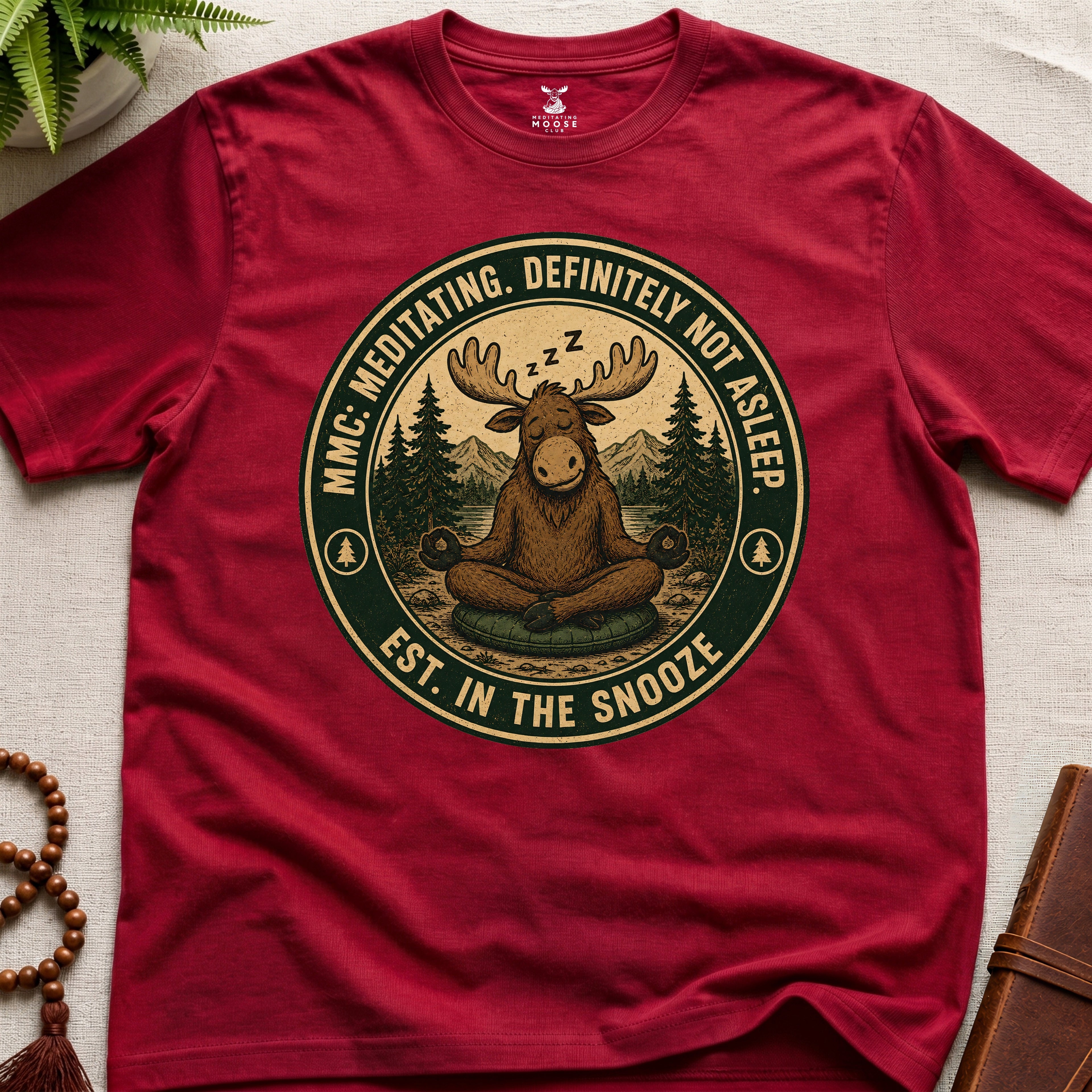 Red funny meditation t-shirt mockup featuring Meditating Moose Club sleepy moose mindfulness graphic