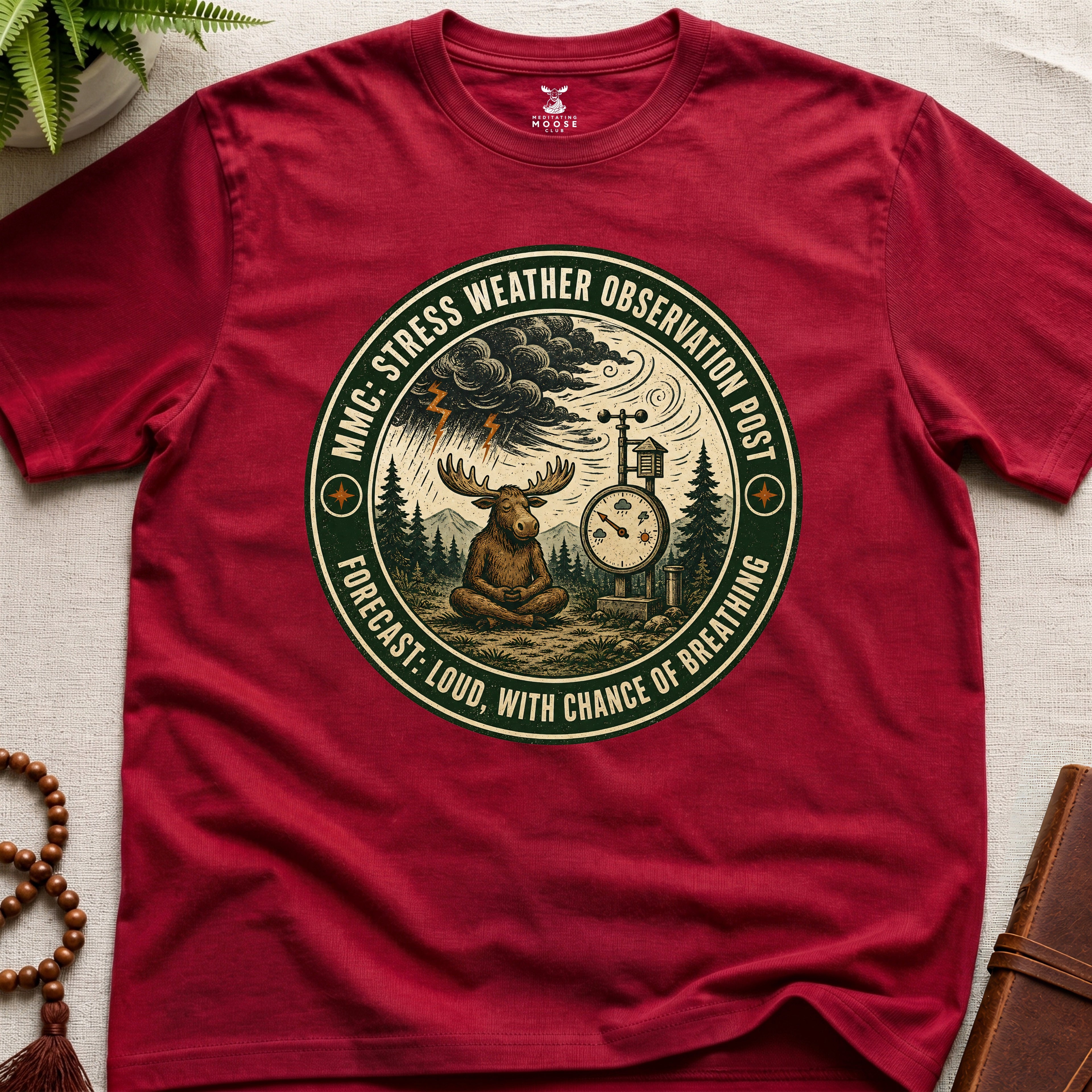 Red funny mindfulness t-shirt mockup featuring Stress Weather Observation Post meditating moose graphic