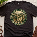 Dark brown mindfulness t-shirt mockup featuring Return Trail Maintenance Crew meditating moose vintage badge graphic