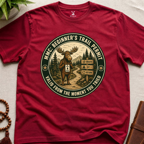 Red mindfulness t-shirt mockup featuring Beginner’s Trail Permit meditating moose beginner meditation graphic