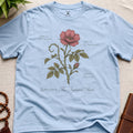 Light blue vintage botanical graphic t-shirt featuring agitated mind natural history illustration