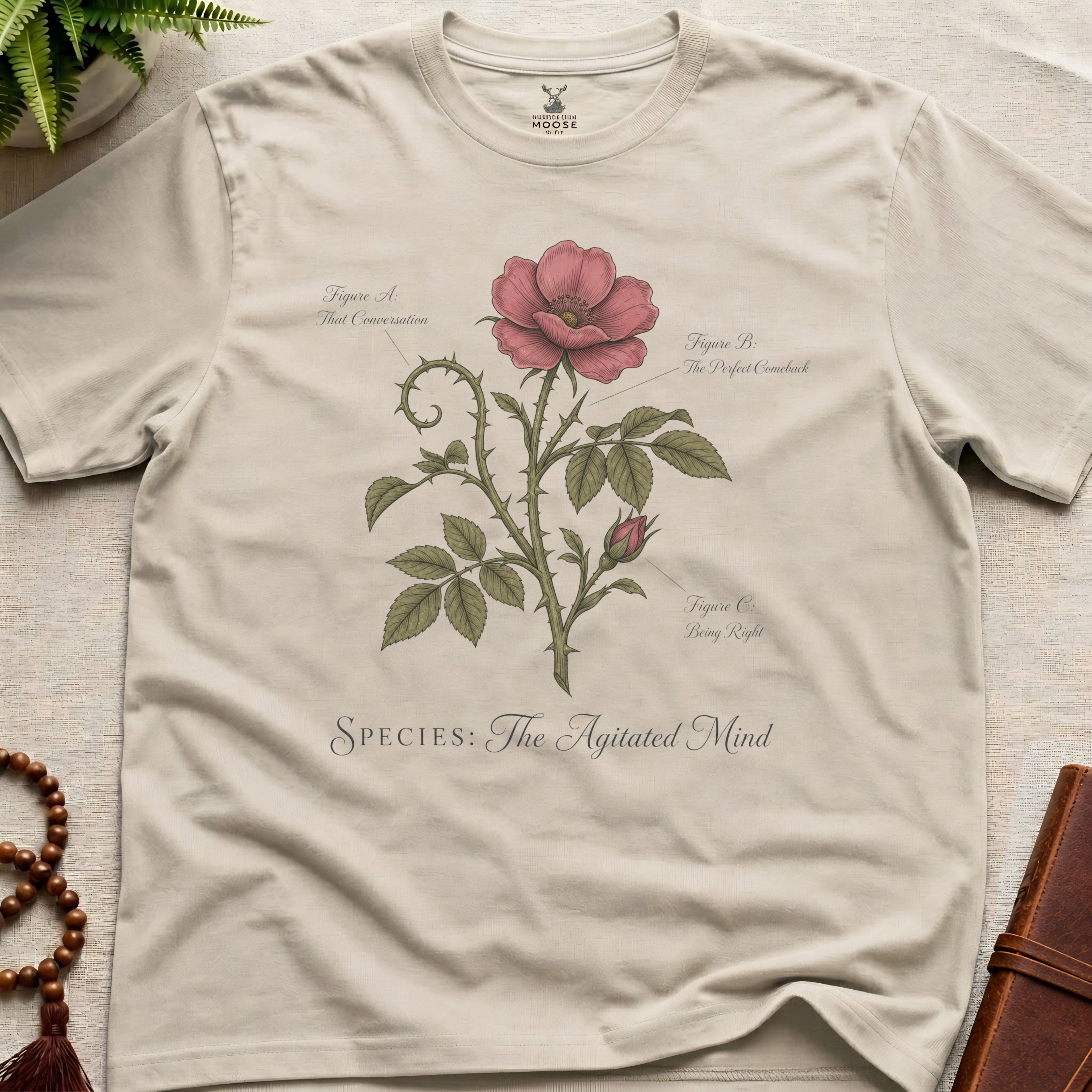 Natural vintage botanical graphic t-shirt featuring agitated mind natural history illustration