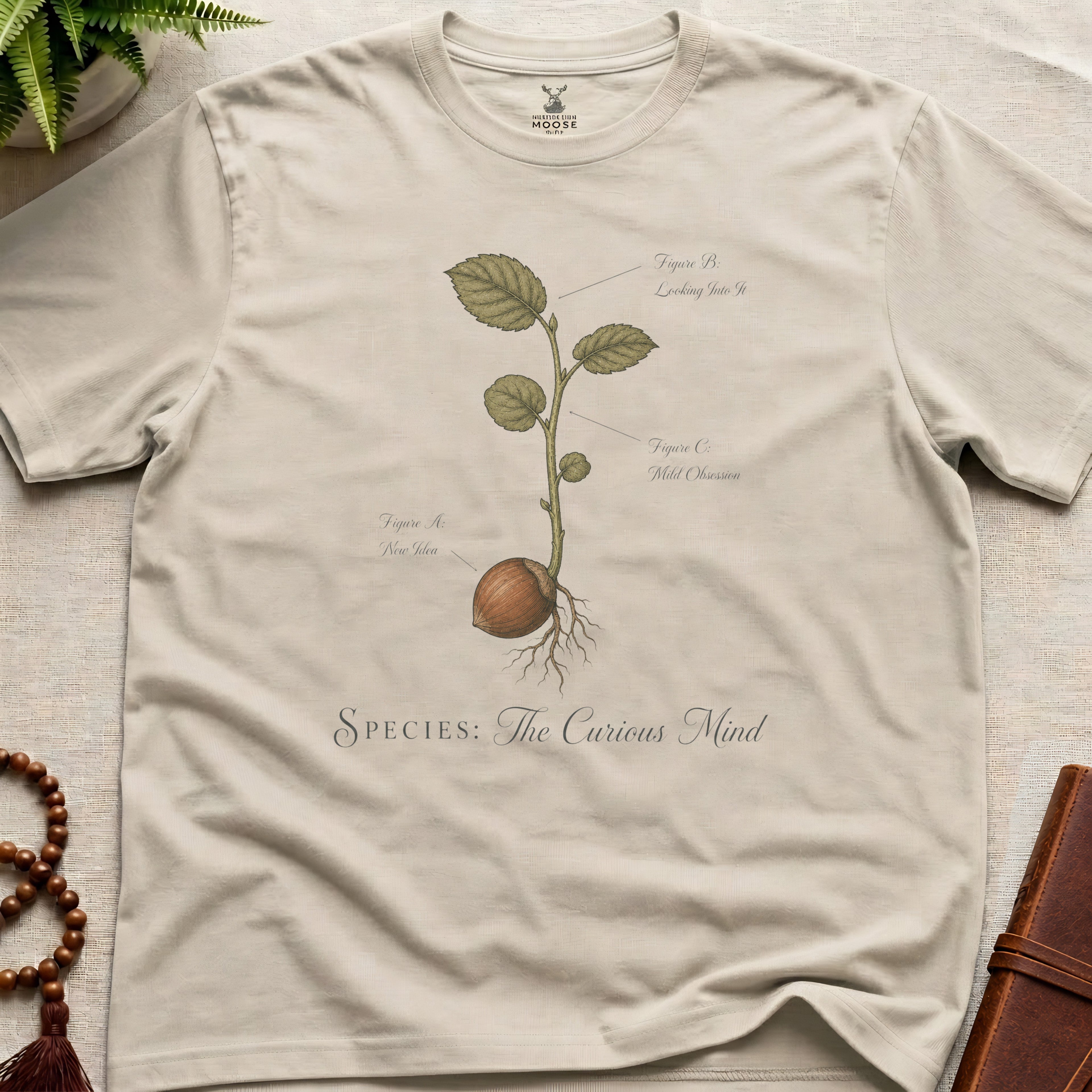 Natural vintage botanical graphic t-shirt featuring wandering mind natural history illustration