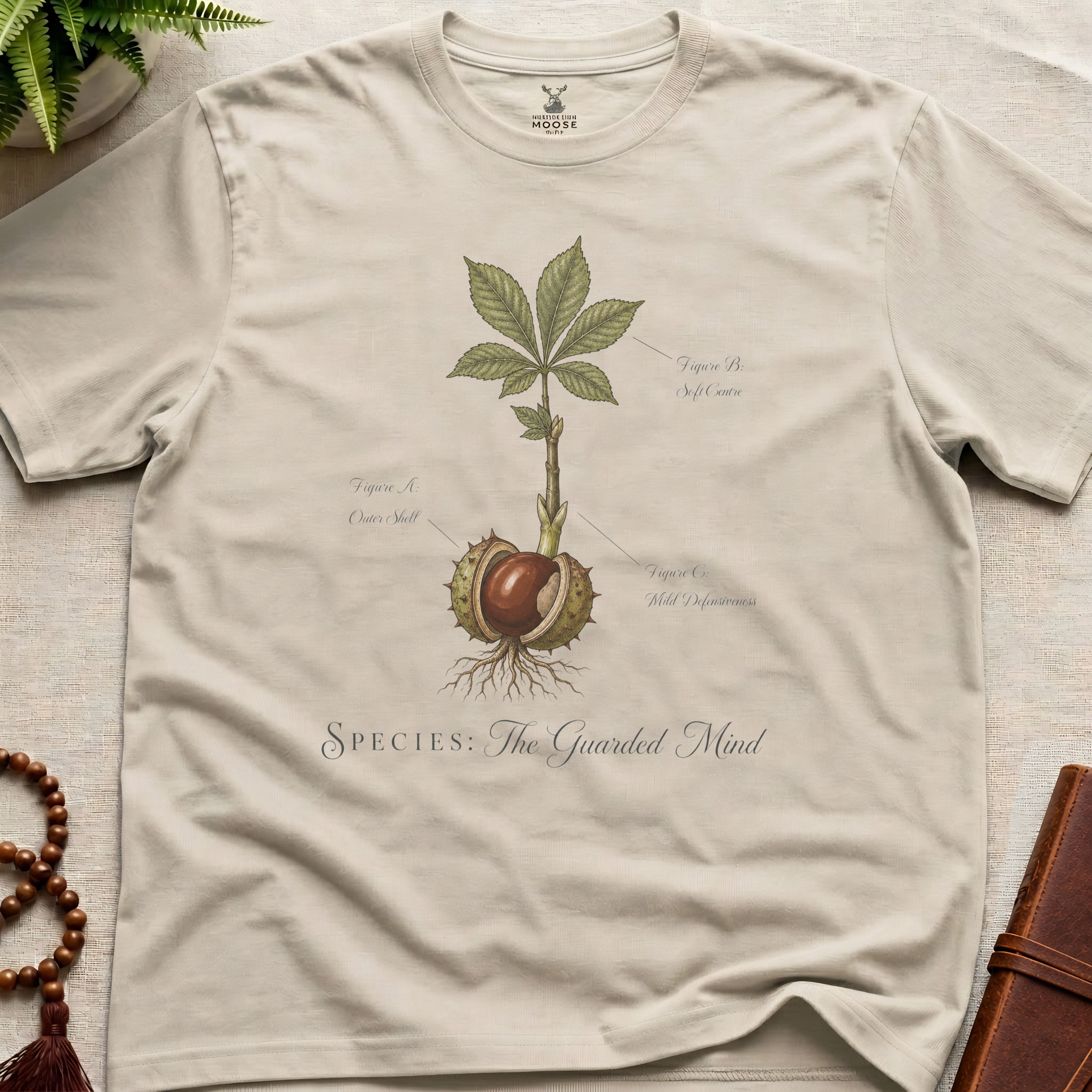 Natural vintage botanical graphic t-shirt featuring guarded mind natural history illustration