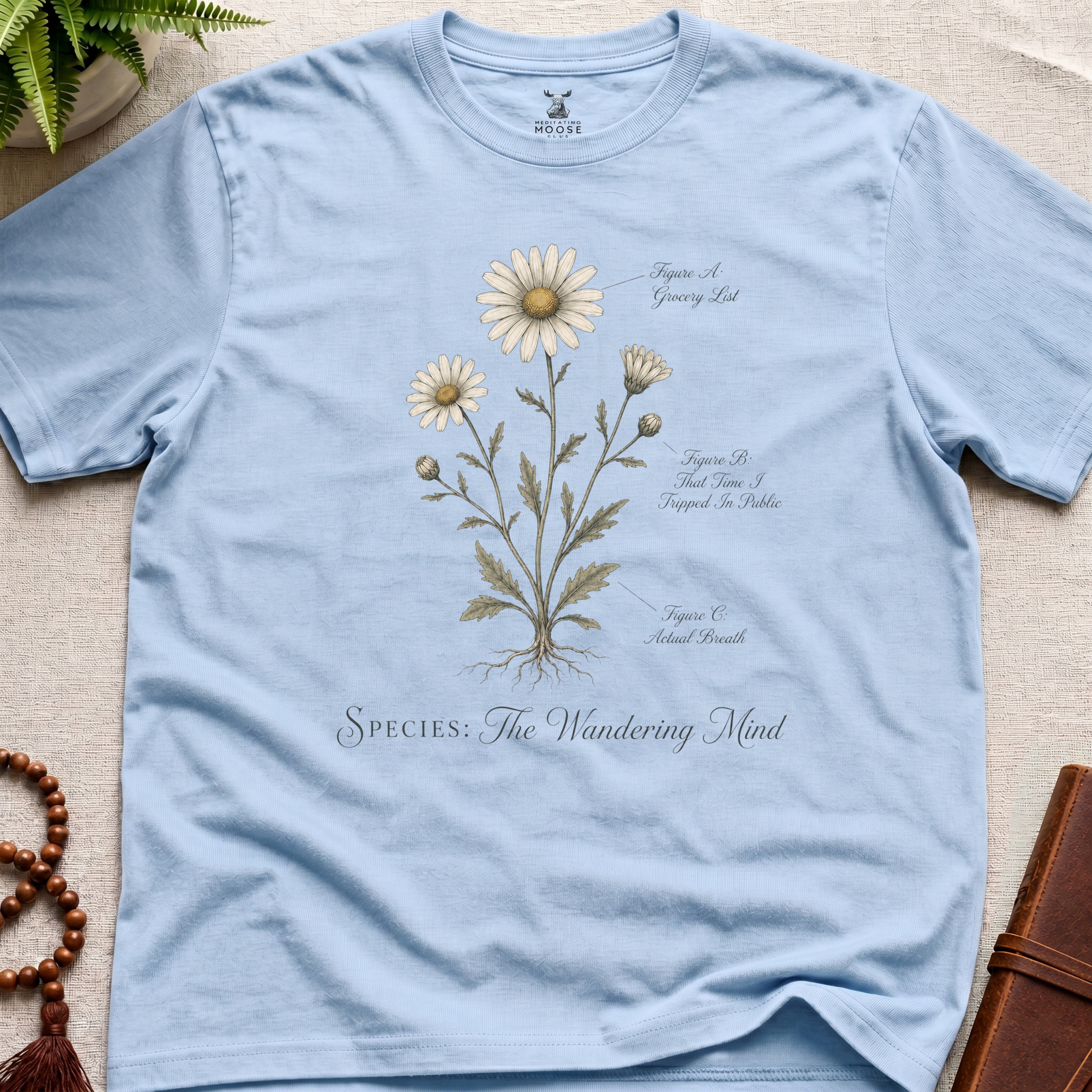 Light Blue vintage botanical graphic t-shirt featuring wandering mind natural history illustration