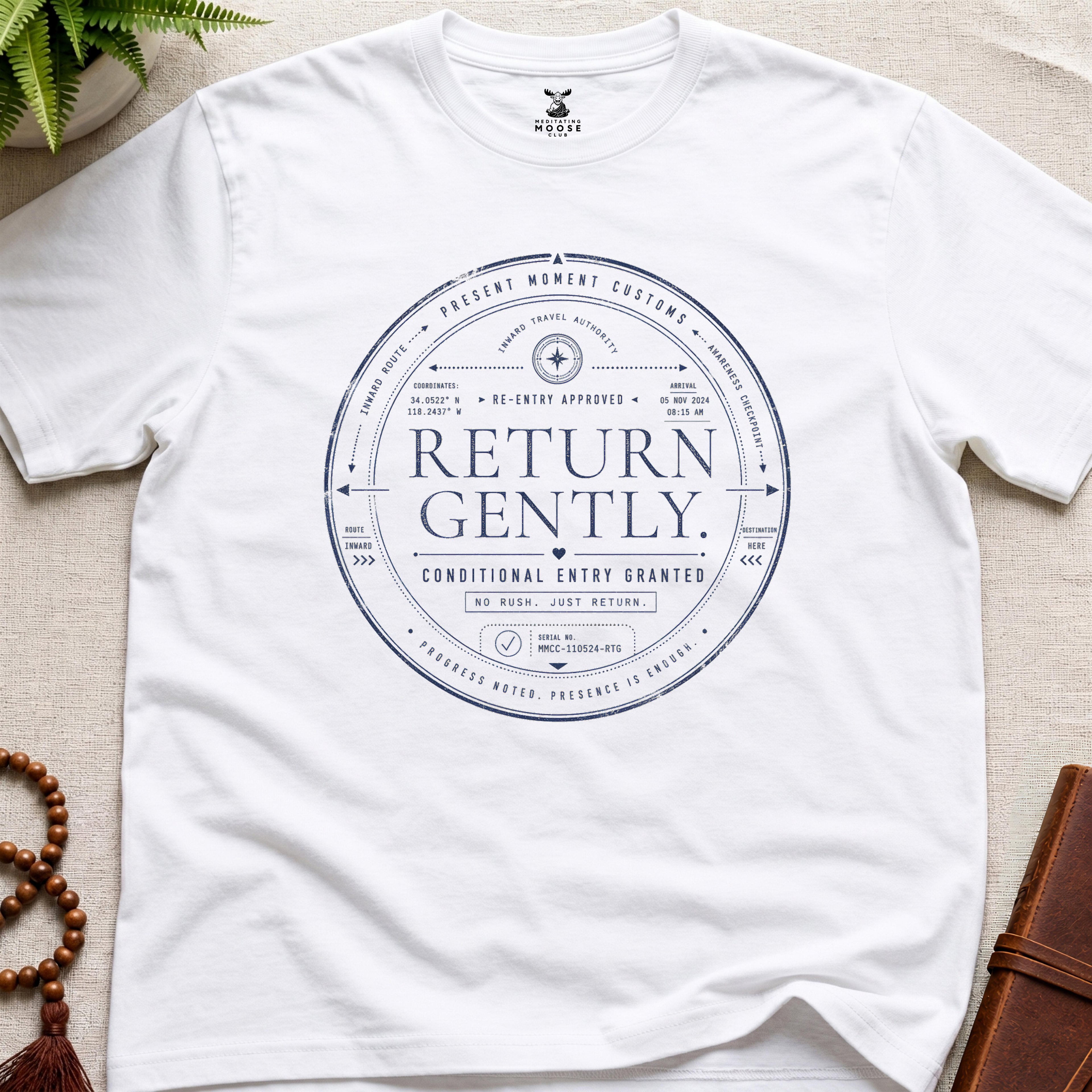 White contemplative circular re-entry approval stamp t-shirt graphic reading “Return Gently” with passport-style typography and mindfulness transit authority markings.