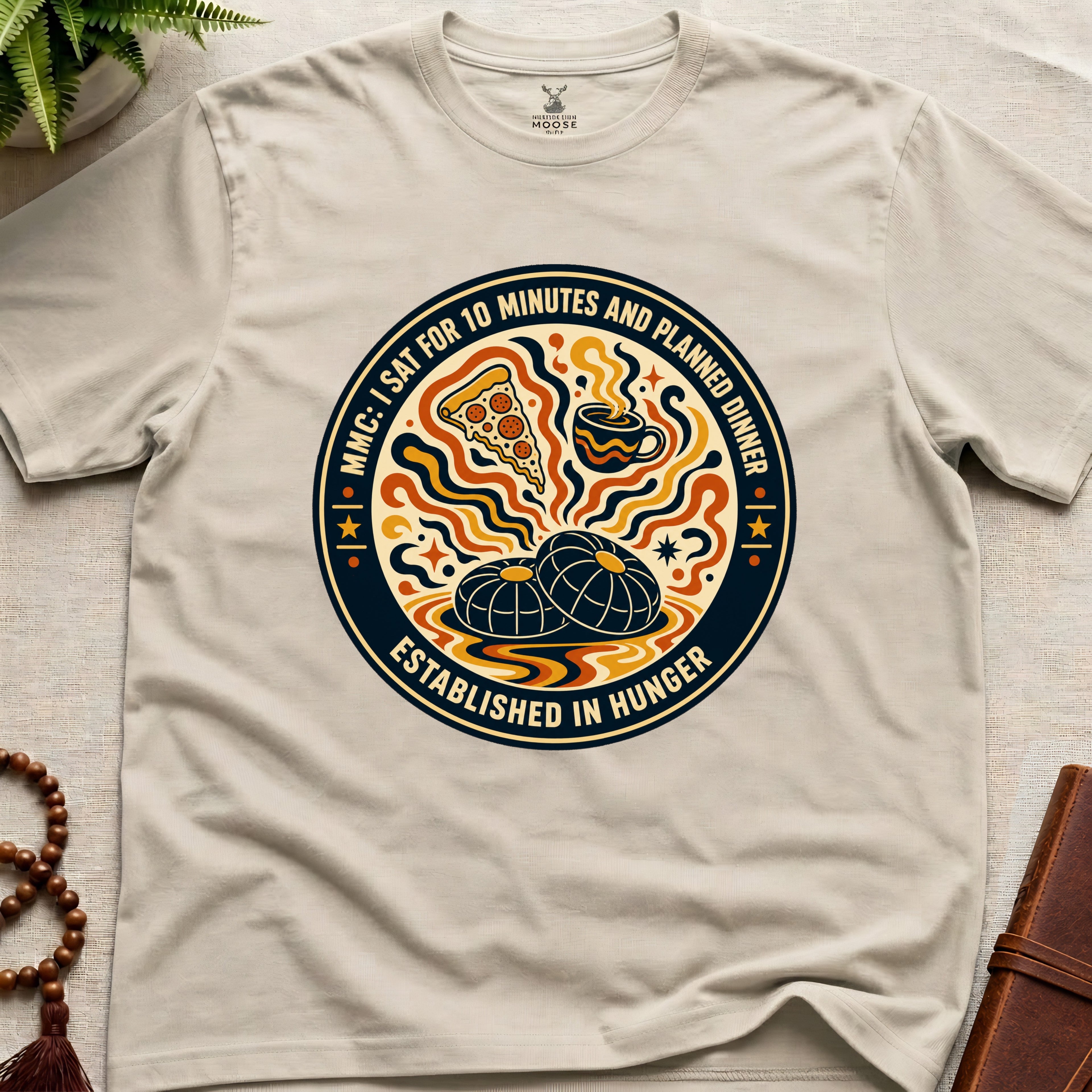 A funny natural cotton colour meditation t-shirt with retro hunger badge design featuring pizza coffee and mindfulness humour