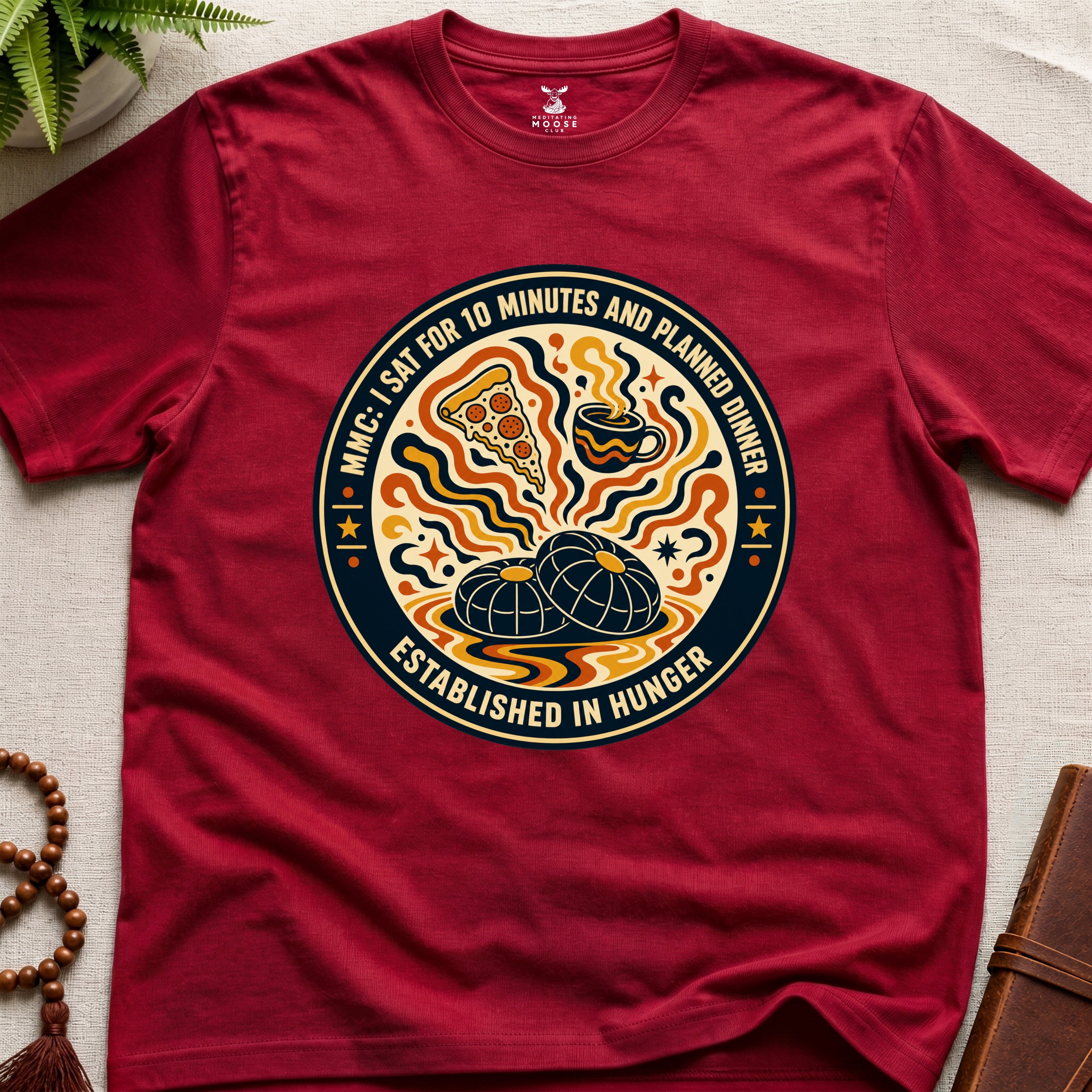 A funny red meditation t-shirt with retro hunger badge design featuring pizza coffee and mindfulness humour